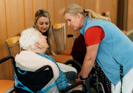Care-Services_Nurse-with-Resident-in-Wheelchair.jpg